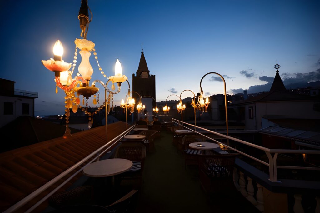 Vintage interior of Fanelli Café in SoHo with wooden booths and lively bar atmosphere in the evening.”