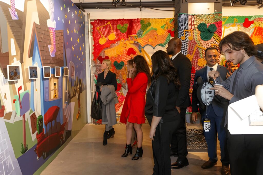 alt="Colorful local art displayed inside a vibrant SoHo in New York gallery"